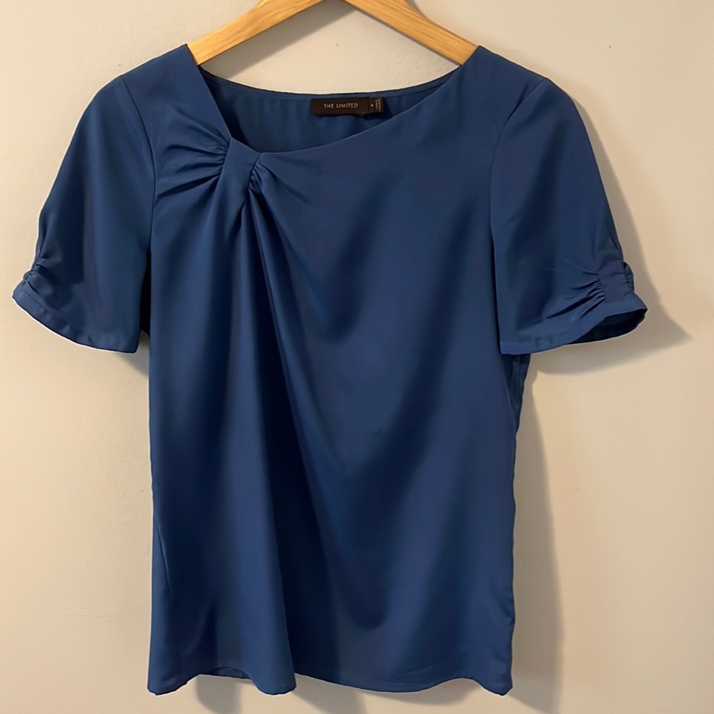 Limited Brands S silky top with asymmetrical neckline & slightly ruched sleeves.